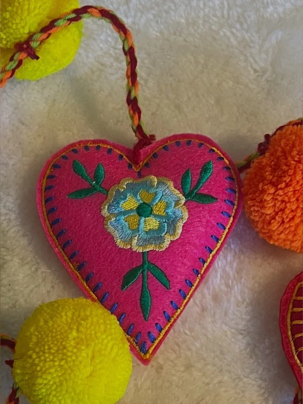 World Market Multicolor Embroidered Heart Pom Pom Garland